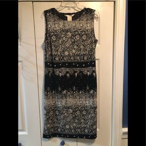 Versatile, wrinkle free sleeveless dress